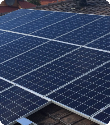 Solar panels on a tiled rooftop