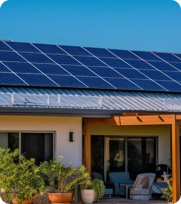 Solar panels on a roof above a patio