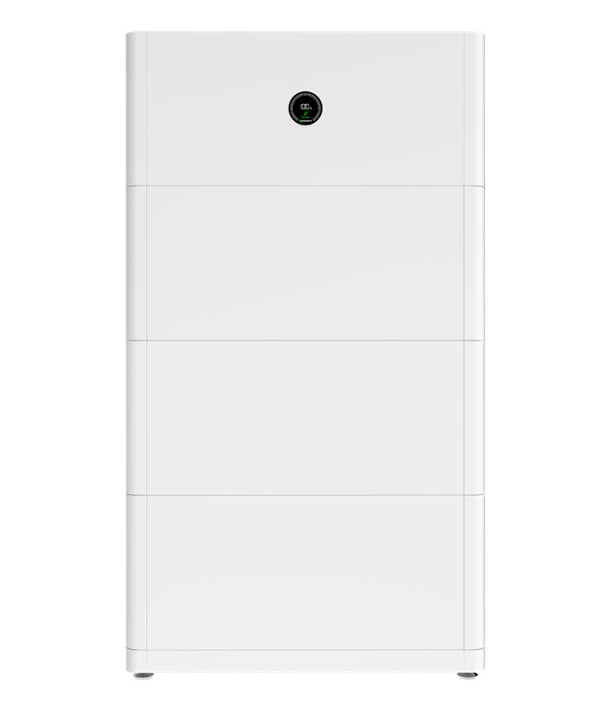 Sleek white home battery system showing full charge on its digital display.