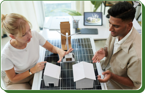 Two people planning a solar energy project